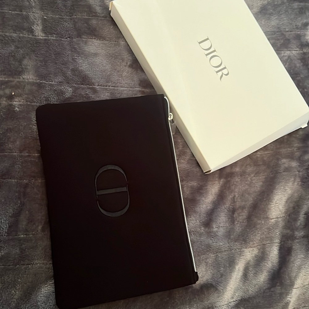 NTW Dior Beauty pouch in black fabric with wipe-able black interior.
